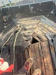 Damaged shingles and wood rot